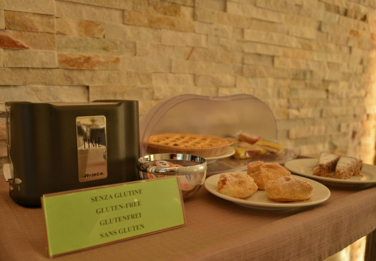 Hotel Sorriso ตอสโกลาโน มาแดร์โน ภายนอก รูปภาพ